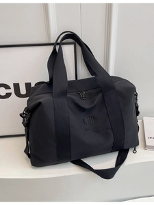Grand sac de voyage polyvalent noir avec poignées et bandoulière amovible