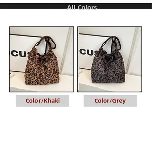 Detailed comparison of khaki and grey leopard print drawstring bucket shoulder bags