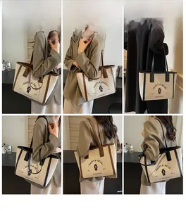 Detailed views of leather handles and cute bear print on casual large capacity tote bags