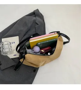 Interior view showing the large capacity of a two-tone tote bag with daily essentials
