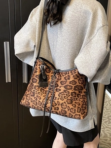 Chic leopard print oversized tote bag for women with fashion tag and black shoulder straps