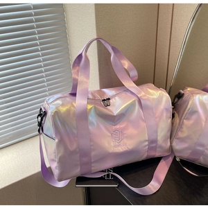 Detailed close-up of iridescent lavender gym bag with Ningjia logo and adjustable strap