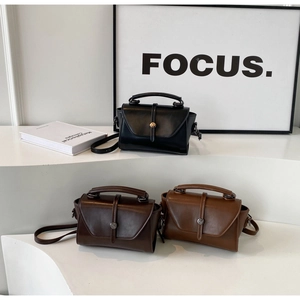 Detailed view of vintage crossbody mini bags in black, dark coffee and brown leather tones