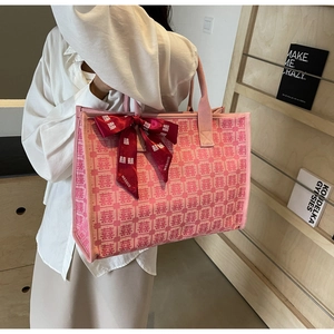 Pink bridal tote bag featuring festive double happiness pattern and red ribbon bow detail