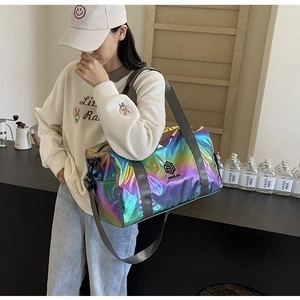Iridescent fitness travel bag with black NINGJIA logo and adjustable grey straps