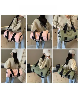 Detail view of pink and green fitness bags showing dual straps and side zipper pocket