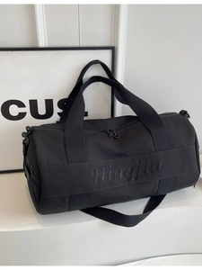 Large black fitness bag with dry-wet separation and adjustable shoulder strap for travel