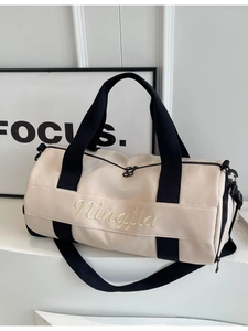 Cream gym bag with black straps and dry wet separation for swimming and fitness sports