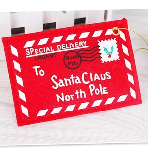 Red felt Christmas envelope hanging ornament with North Pole postmark for tree decoration