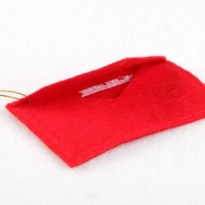 Red felt Christmas envelope hanging ornament with gold string and white woven label detail