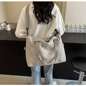 Grand sac de voyage en toile gris clair avec broderie NINGJIA et bandoulière réglable pratique