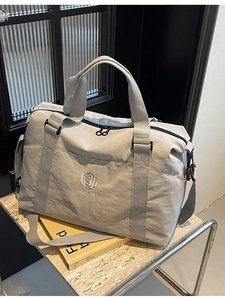 Sac de voyage beige grande capacité avec poignées renforcées et broderie NINGJIA
