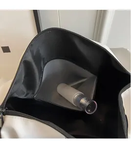 Detail of travel bag interior with waterproof dry-wet separation pocket and zipper