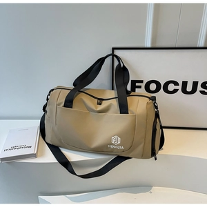 Detail view of khaki travel duffel bag with dry-wet separation and side shoe compartment