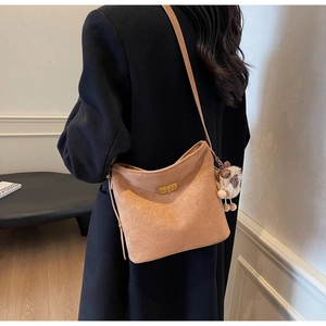 Brown suede hobo shoulder bag with gold twist lock and cute plush sheep charm