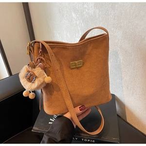 Brown frosted leather Hobo bag with gold twist lock and cute plush sheep charm detail