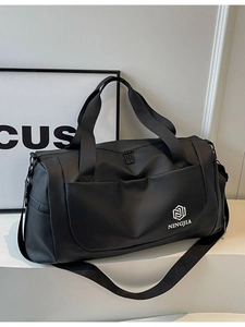 Black large capacity waterproof travel bag with dual handles and adjustable shoulder strap