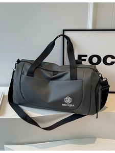 Large dark grey travel bag with waterproof nylon fabric and adjustable shoulder strap