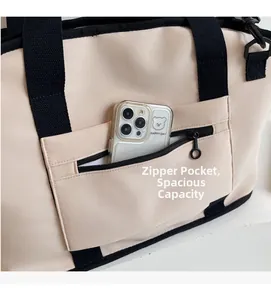 Detail of canvas tote bag showing a functional front zipper pocket for smartphones
