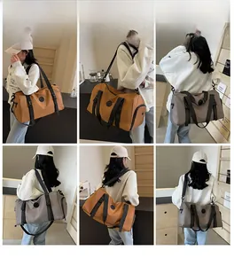 Macro view of water-resistant travel bags in caramel and grey with adjustable straps