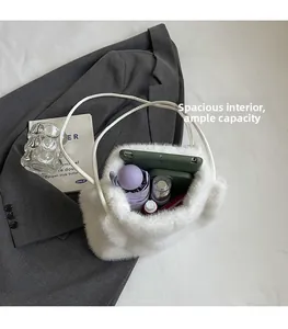 Interior view of large white faux fur tote bag showing ample space for daily essentials