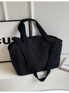 Lightweight black yoga gym bag with NINGJIA logo embroidery and adjustable strap