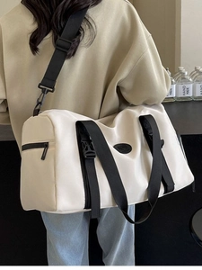 Cream white waterproof travel bag with black straps and logo for sports and gym