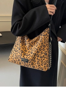 Leopard print hobo tote bag with silver chain strap and leather logo detail
