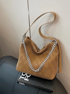 Caramel pleated leather bucket bag with silver chain strap and large capacity