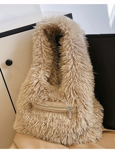 Fuzzy faux fur tote bag in beige with front zipper pocket and plush handle design