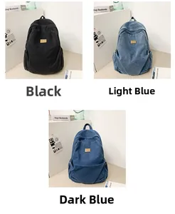 Washed denim backpack set in black, light blue, and dark blue retro styles