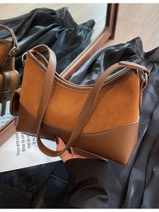 Retro braune Tragetasche aus mattem Leder mit passender kleiner runder Tasche dazu