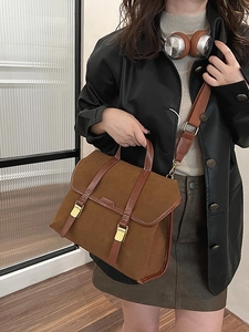 Brauner Retro-Wildlederrucksack mit Lederbesatz und goldenen Metallschnallen