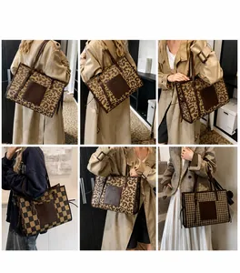 Detail view of large tote bags in leopard, checkerboard, and houndstooth patterns