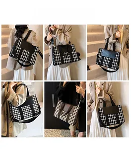 Close-up of vintage houndstooth tote bag with leather handles and adjustable shoulder strap