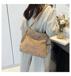 Fashionable textured large capacity backpack with vintage contrast panel and leather details