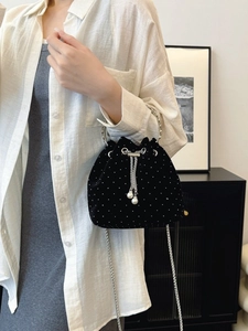 Elegant black velvet bucket bag with silver rhinestones and pearl drawstring charms