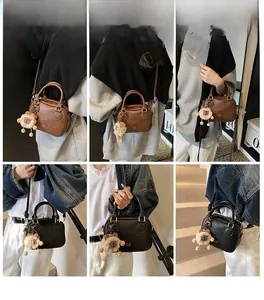 Detail shots of retro crossbody bags in brown and black with plush lion pendants