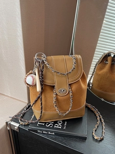 Brown frosted leather mini backpack with silver chain and baseball charm for women