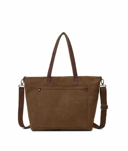 Vista frontal del bolso tote de lona marrón con asas de cuero y correa de hombro ajustable