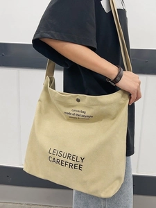 Khaki large capacity canvas messenger bag with Leisurely Carefree print design