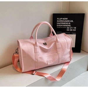 Bolso de viaje rosa de gran capacidad con logo NOGO y correa ajustable de piel