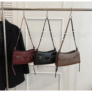 Three vintage faux leather underarm bags in burgundy black and dark coffee with metal buckles
