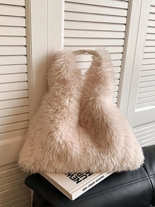 Fuzzy faux fur tote bag in creamy off-white with large capacity and soft plush texture