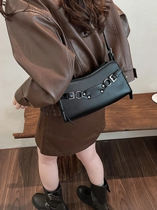 Retro black leather baguette shoulder bag with metallic rivets and buckles for women