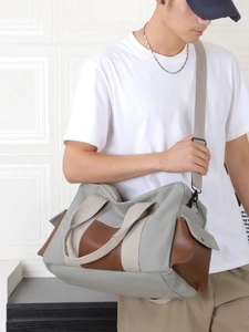 Canvas and leather travel duffel bag with large capacity for fitness and short trips