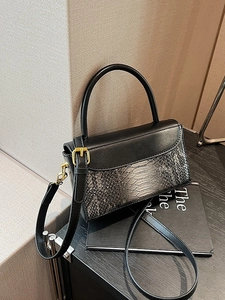 Retro black faux leather handbag with gradient snakeskin pattern and gold hardware