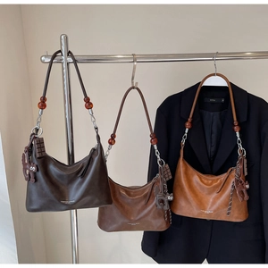 Three gradient brown hobo bags with amber bead straps and cute decorative charms