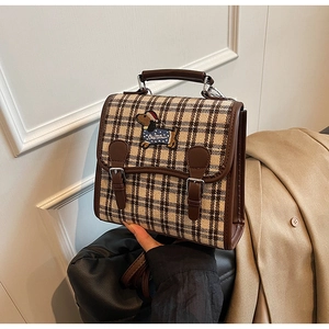 Detail of British style check crossbody bag with cute dachshund embroidery and PU leather strap