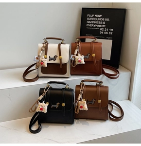 Mini vintage leather backpacks with dachshund embroidery and plush charms in four colors